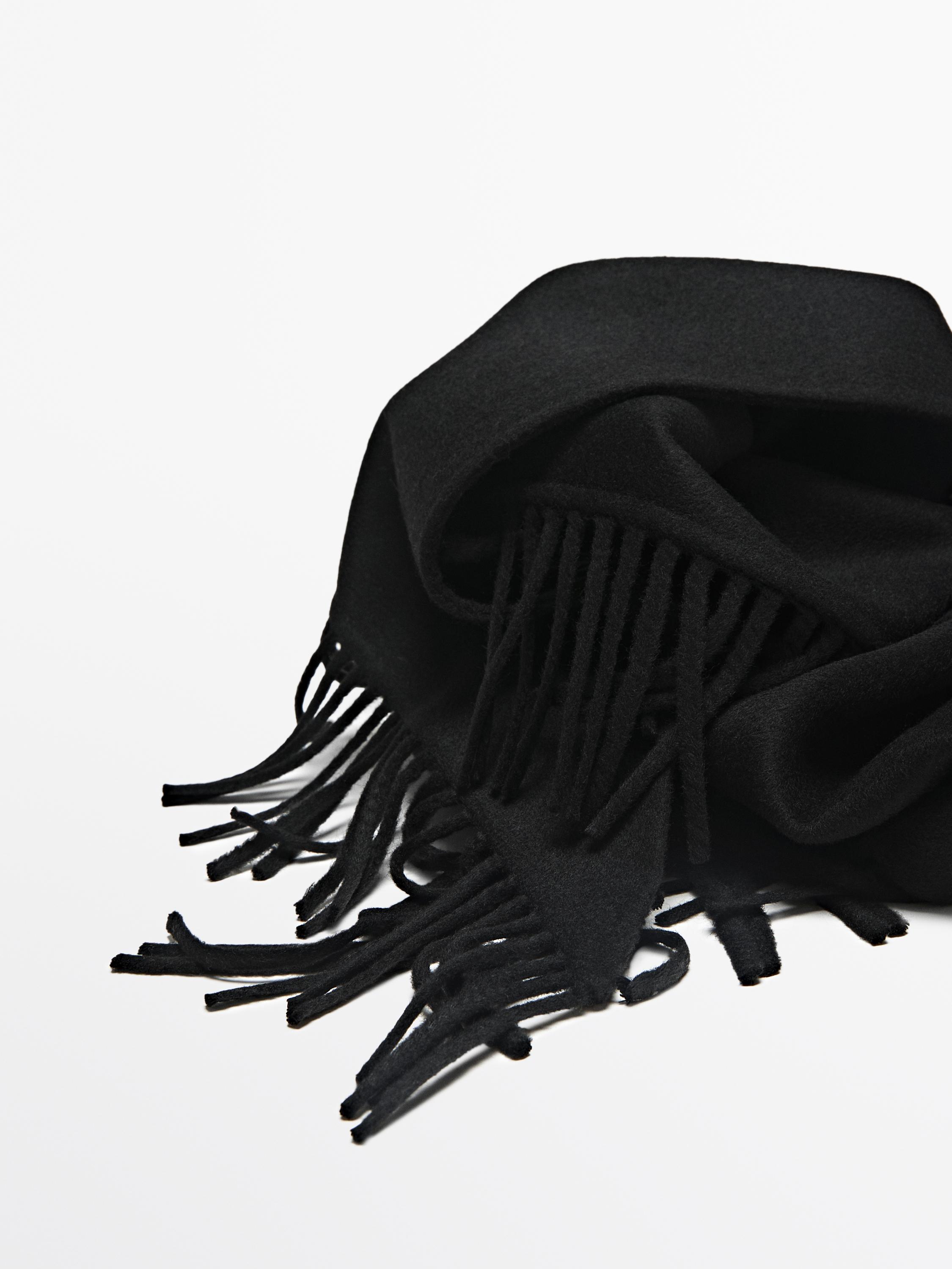 Wool blend knit cape with fringing